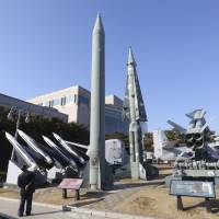 A mock North Korean Scud-B missile (center left) and South Korean missiles are displayed at the Korea War Memorial Museum in Seoul. North Korea on Monday fired a projectile into the waters off its east coast, South Korea\'s military said, in an apparent missile test that comes days after Washington and Seoul began huge military drills that Pyongyang insists are an invasion rehearsal. | AP