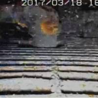 Grating inside the containment vessel of the No. 1 reactor at the crippled Fukushima No. 1 nuclear plant is seen in this handout image captured by a robot Saturday. | TEPCO