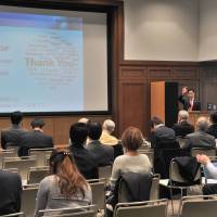 William Hiroyuki Saito, a special advisor to the Cabinet Office on cybersecurity, delivers a lecture on the importance of Japan\'s participation in discussions of global issues in Tokyo on March 13. | YOSHIAKI MIURA