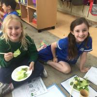 Students enjoy their school-grown produce. | COURTESY OF JON WALSH