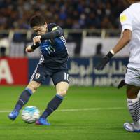 Shinji Kagawa scores Japan\'s first goal against Thailand on Tuesday. | AP