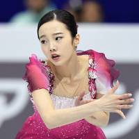 Marin Honda performs her free-skate routine at the World Junior Figure Skating Championships on Saturday. | KYODO