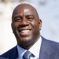 Magic Johnson, the Los Angeles Lakers\' new president, is an omnipresent figure in the sports world. | AP