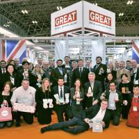 Attendees and exhibitors, including British Ambassador Paul Madden, CMG, and his wife Sarah, pose in front of the Britain and Northern Ireland booth at the Foodex Japan 2017 opening ceremony at Makuhari Messe in Chiba Prefecture on March 7. | YOSHIAKI MIURA