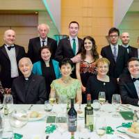 Princess Takamado (front row, center), Irish Ambassador Anne Barrington (front row, second from right), Irish Minister for Public Expenditure and Reform Paschal Donohoe (front row, right) and other guests pose at the Emerald Ball, which raises money for three charities, at the Tokyo American Club, on March 18. | ANTONY TRAN