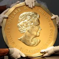One of the world\'s largest gold coins, a 2007 Canadian \"Big Maple Leaf,\" is displayed in Vienna in June 2010. An identical coin stolen from Berlin\'s Bode Museum on Monday has a face value of 1 million Canadian dollars (&#36;750,000). By weight alone, however, it would be worth almost &#36;4.5 million at market prices. | REUTERS