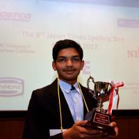 Shantanu Edgaonkar of Global Indian International School in Tokyo smiles on Saturday after winning the eighth Japan Times Bee, held at the newspaper\'s headquarters in Minato Ward, Tokyo. Edgaonkar correctly spelled \"toxicosis\" to clinch a chance to represent Japan at the finals in the United States. | SATOKO KAWASAKI