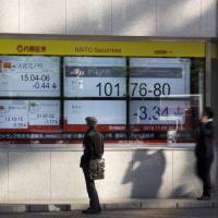 Stock index futures tumbled and the yen surged as investors braced for a win by Republican Donald Trump last Nov. 9. | BLOOMBERG