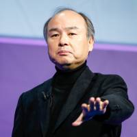 Masayoshi Son Son and Bezos set to clash in India e-commerce expansion