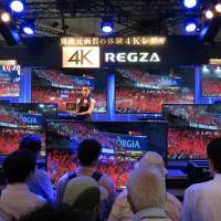Toshiba Corp.’s Regza TVs are displayed at CEATEC 2013, Japan’s biggest annual electronics trade show, at Chiba’s Makuhari Messe. Toshiba mulls selling unprofitable domestic TV business