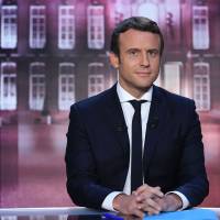French presidential election candidate for the En Marche ! movement Emmanuel Macron poses before taking part in the show \"Elysee 2017\" on French television channel TF1 in Paris on Thursday. | AFP-JIJI