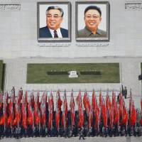 People practice Wednesday for an expected parade on Pyongyang\'s main Kim Il Sung Square set for Saturday, the 105th anniversary of the birth of North Korean founder Kim Il Sung. | REUTERS