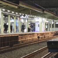 Odakyu railway\'s Kakio Station in Kawasaki is seen Monday evening after two elderly women who jumped onto the tracks were fatally hit by a train. | KYODO