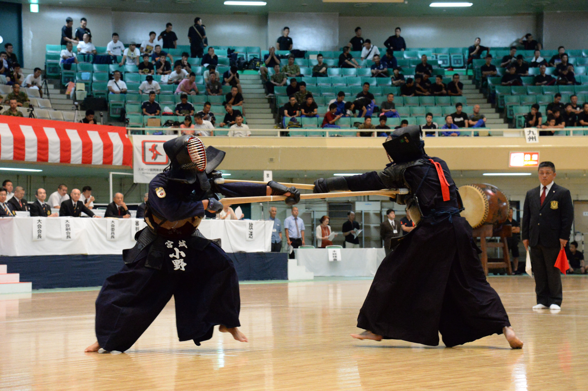 Jukendo martial art players participate in a national championship held at Tokyo's Nippon Budokan in August 2014. The sport, mostly practiced by Self-Defense Forces personnel, will be included on the list of martial arts that can be taught at junior high schools. | ALL JAPAN JUKENDO FEDERATION