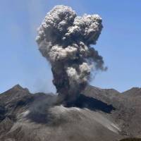Mount Sakurajima\'s latest eruption is seen from Tarumizu, Kagoshima Prefecture, at 11:02 a.m. on Friday. | KYODO