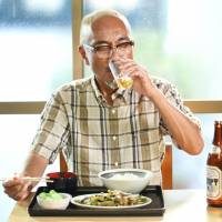 Day drinking: Naoto Takenaka\'s \"Samurai Gourmet\" character enjoys a beer with his lunch. | &#169; MASAYUKI QUSUMI, SHIGERU TSUCHIYAMA, GENTOSHA