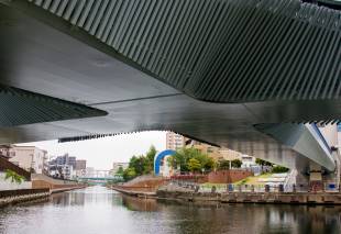 The underside of the cross-shaped Clover Bridge in Koto Ward.