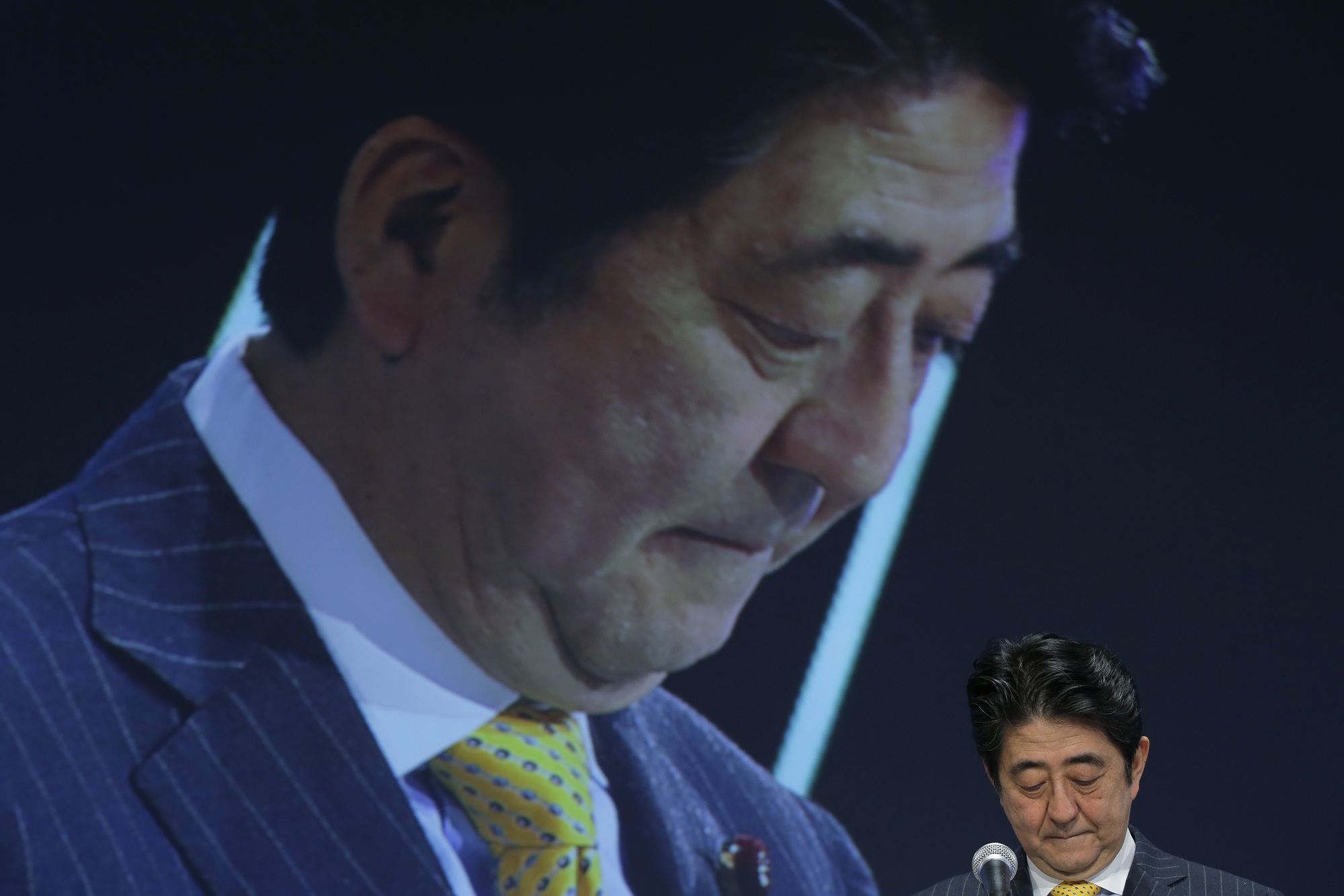 Sad: Could the policies of Prime Minister Shinzo Abe have something to do with why so many Japanese report feeling so unhappy? | KIYOSHI OTA / BLOOMBERG