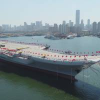 China launched its first domestically built aircraft carrier Wednesday, demonstrating the growing capabilities of its defense industries. | AP
