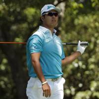 Hideki Matsuyama reacts after hitting his tee shot on the second hole during the third round of the Masters in Augusta, Georgia, on Saturday. Matsuyama implodes to leave Masters hopes in tatters