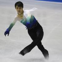 World champion Yuzuru Hanyu attempted five quadruple jumps during his free skate on Friday night at the World Team Trophy in Tokyo. Hanyu is considering having five quads in his free skate for the Olympic season. | AP