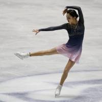 Russia\'s Evgenia Medvedeva competes in the women\'s free skate on Saturday. | REUTERS