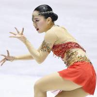 Wakaba Higuchi sets a personal-best score (145.30), hitting seven triple jumps in Saturday\'s free skate. | KYODO