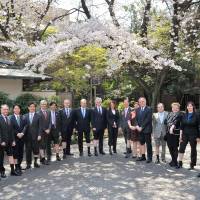 Ambassadors, diplomats, ministry staff and members of the parliamentary friendship groups show their support at the Colombian embassy in Tokyo on April 4. | YOSHIAKI MIURA