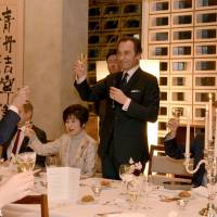 French Ambassador Thierry Dana (center) raises a glass with President of the Japan-France House of Councillors Friendship League Akiko Santo (left), President of the House of Representatives\' Friendship League Nobuteru Ishihara (right) and other guests at a \"Good France\" dinner at the ambassador\'s residence in Tokyo on March 17. | FRENCH EMBASSY
