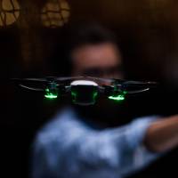 Michael Perry, director of strategic partnerships at SZ DJI Technology, pilots the Spark gesture-controlled drone during the company\'s launch event in New York on Wednesday. | BLOOMBERG