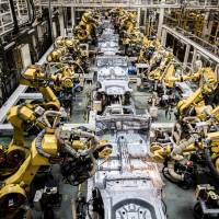 Increased automation and more use of robotic technology in Japan and Germany could help cushion the impact of their aging populations. | BLOOMBERG
