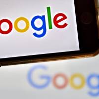 The Google logo is seen in this file photo. On Sunday China announced plans to further strengthen its control over search engines and online news portals. Under the country\'s already tight internet controls, popular sites such as Google and Facebook are blocked. | AFP-JIJI