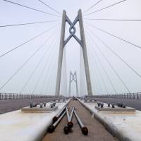 The Hong Kong-Zhuhai-Macau bridge is shown from Zhuhai, China, on Wednesday. Upcoming China-Hong Kong bridge: unifying link, or tentacle of Beijing control?
