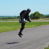 Inventor Richard Browning of the technology startup Gravity flies in his “Iron Man”-style jet suit at Henstridge airfield in Somerset, England, on Thursday. Britain's real-life 'Iron Man' has high hopes for jet suit