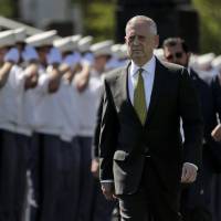 Secretary of Defense James Mattis walks into Michie Stadium to give the commencement address, Saturday in West Point, New York. | AP