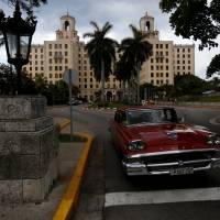 A vintage car leaves the Hotel Nacional in Havana on May 22. | REUTERS