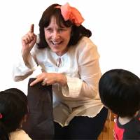 Acting out: Teacher Ellen Fryer entertains children during a drama workshop at Tokyo Children’s Garden. | DANIELLE DEMETRIOU