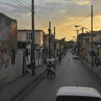 A street like any other: Sundown in the city of Holguin. | TYLER ROTHMAR