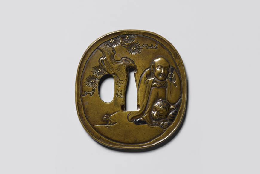 In Praise of Swords: Masterpieces of Kurokawa Institute of Ancient Cultures An important cultural property tsuba (sword guard) with a design featuring Feng-gan, by Tsuchiya Yasuchika (18th century) | KUROKAWA INSTITUTE OF ANCIENT CULTURES