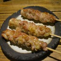 Minus the yoke: Sumiba Yakitori Enza\'s <em>tsukune</em> minced chicken. | J.J. O\'DONOGHUE