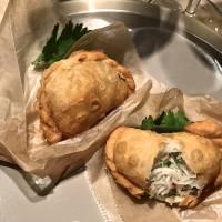 The daikon pies at Mimosa are empanada-like pastries, filled with shredded white radish mixed with specks of umami-rich Jinhua ham and finely diced negi scallions | ROBBIE SWINNERTON