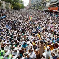 Activists gather in front of Baitul Muqarram National Mosque after Friday prayers to demand the removal of the statute of the Greek goddess Themis from the Supreme Court premises in Dhaka on April 21. Escalating threats to secularism in Bangladesh