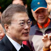 New South Korean President Moon Jae-in could find himself boxed in by a U.S. administration eager to confront North Korea. | REUTERS