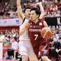 Kawasaki\'s Ryusei Shinoyama dribbles the ball during Friday\'s game at Todoroki Arena. | KAZ NAGATSUKA