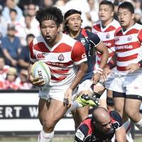 Japan\'s Shota Horie scores a second-half try against Hong Kong on Saturday at Prince Chichibu Memorial Rugby Ground. Japan won 29-17. | KYODO