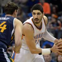 Oklahoma City Thunder center Enes Kanter (right) has reportedly had a warrant issued for his arrest by the Turkish government citing him as a terrorist. | USA TODAY / VIA REUTERS