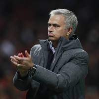 Manchester United manager Jose Mourinho applauds fans at Old Trafford after Thursday’s Europa League semifinal second leg against Celta Vigo. Mourinho puts United's season on the line