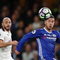 Chelsea’s Eden Hazard eyes the ball during Monday’s Premier League game against Watford. Premier League season winds down to underwhelming finish