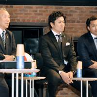 Former Japan players Yoshihiro Sakata (left) and Daisuke Ohata speak during Saturday\'s event in Kyoto to promote Wednesday\'s draw for the 2019 Rugby World Cup. | KYODO