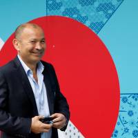 England head coach Eddie Jones arrives at Kyoto State Guest House for the pool draw for the 2017 Rugby World Cup on Wednesday. | REUTERS